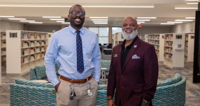 CEO Gregory A. Hill, Sr. and Branch Manager Michael Jenkins ready to welcome visitors to the Pike Branch Grand Re-opening.