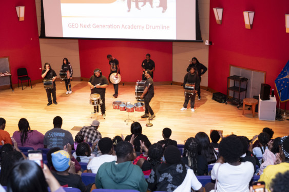 Geo Next Drumline performing for the crowd in Clowes Auditorium.